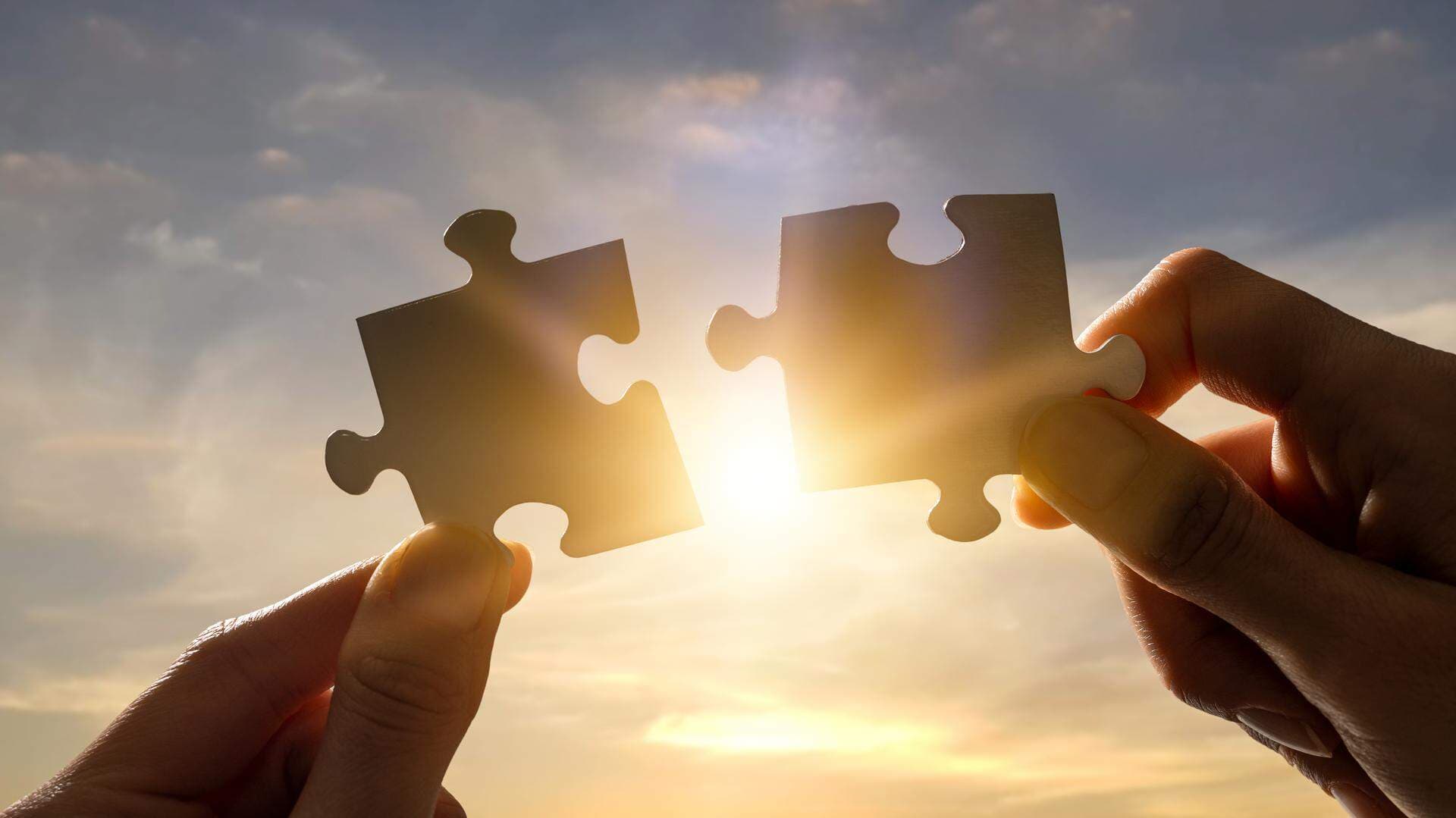 Två pusselbitar som ska passa ihop