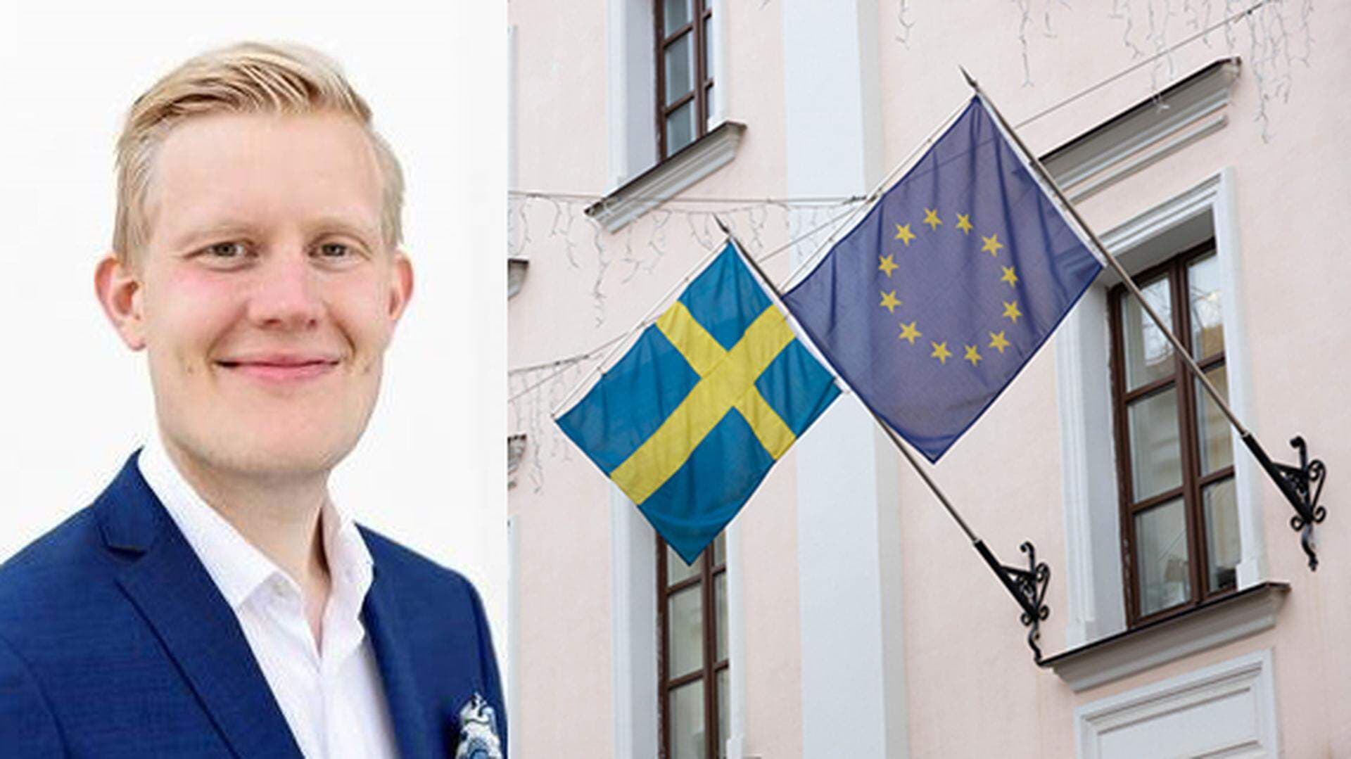 Erik Hultgren samt en EU-fasadflagga